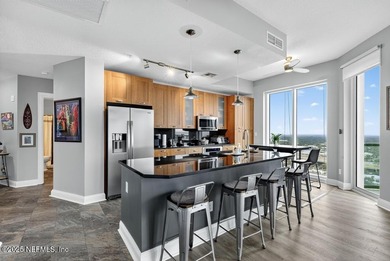 Luxury Riverfront Condominium with Stunning Views & High-End - photo 6