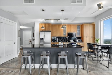 Luxury Riverfront Condominium with Stunning Views & High-End - photo 8