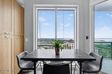 Luxury Riverfront Condominium with Stunning Views & High-End - photo 9