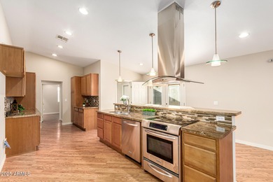 Step inside this uniquely crafted mid-century home in downtown