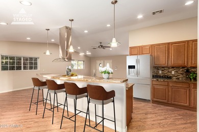 Step inside this uniquely crafted mid-century home in downtown