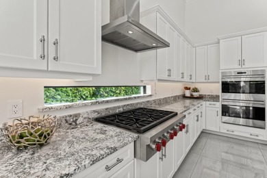 Exceptionally upgraded Callahan model in prestigious Royal Palm - photo 10