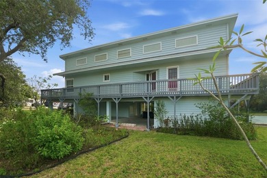 ELEVATED KEY WEST STYLE HOME. GREAT ROOM FLOOR PLAN WITH ISLAND - photo 1