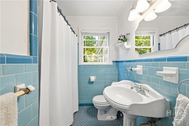 Full of historic charm, this 1950-built bungalow sits in - photo 13