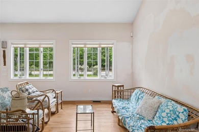 Set on a private 1.18-acre property in Hampton Bays, this - photo 13