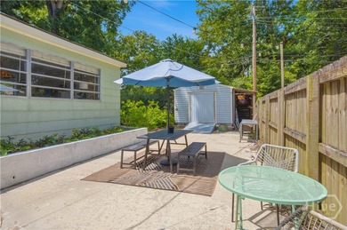 Full of historic charm, this 1950-built bungalow sits in - photo 17