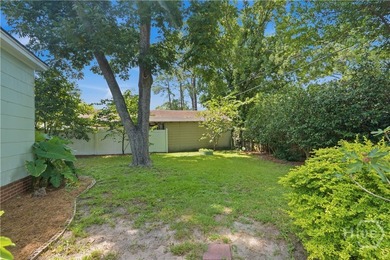 Full of historic charm, this 1950-built bungalow sits in - photo 18