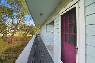 ELEVATED KEY WEST STYLE HOME. GREAT ROOM FLOOR PLAN WITH ISLAND - photo 8
