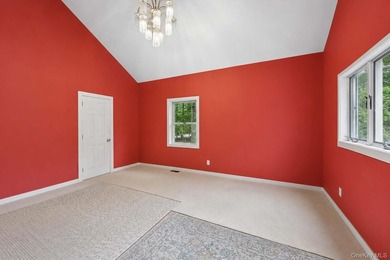 Set on a private 1.18-acre property in Hampton Bays, this - photo 18
