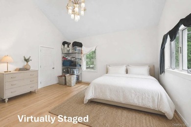 Set on a private 1.18-acre property in Hampton Bays, this - photo 19