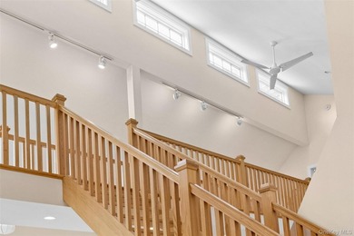 Set on a private 1.18-acre property in Hampton Bays, this - photo 25