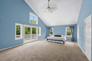 Set on a private 1.18-acre property in Hampton Bays, this - photo 28