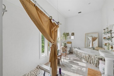 Set on a private 1.18-acre property in Hampton Bays, this - photo 30