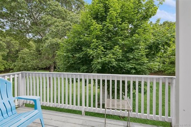 Set on a private 1.18-acre property in Hampton Bays, this - photo 31
