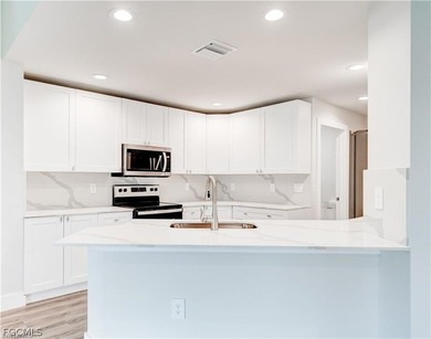 Located in the highly desirable Southwest Cape Coral area, this - photo 3