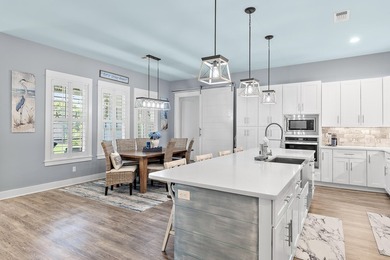 Escape to effortless coastal living in this bright and airy - photo 1