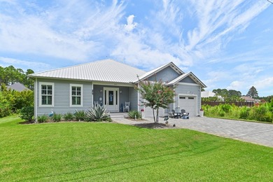 Escape to effortless coastal living in this bright and airy - photo 2