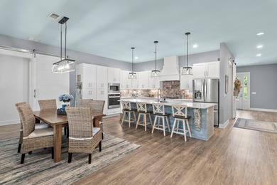 Escape to effortless coastal living in this bright and airy - photo 6