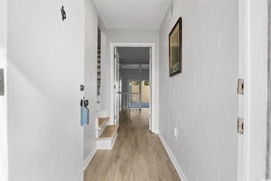 Completely renovated and ideally located, this stunning - photo 3