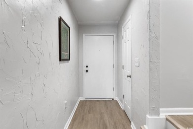 Completely renovated and ideally located, this stunning - photo 4