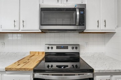 Completely renovated and ideally located, this stunning - photo 9