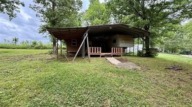 1 lot in the Illinois River Village with an existing RV and - photo 3