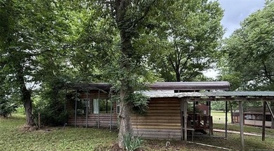 1 lot in the Illinois River Village with an existing RV and - photo 4