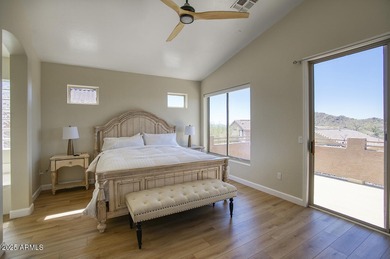 Gorgeous remodeled gated home in Las Sendas! Enter through the