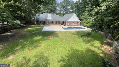 Welcome home to this stately 4-sided brick ranch tucked away on - photo 14