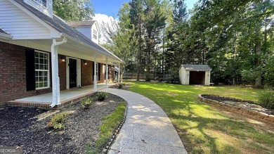 Welcome home to this stately 4-sided brick ranch tucked away on - photo 17