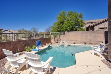 Gorgeous remodeled gated home in Las Sendas! Enter through the