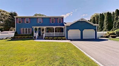 This stately residence is situated on a private street, north of - photo 1