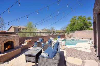 Gorgeous remodeled gated home in Las Sendas! Enter through the