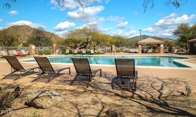 Gorgeous remodeled gated home in Las Sendas! Enter through the