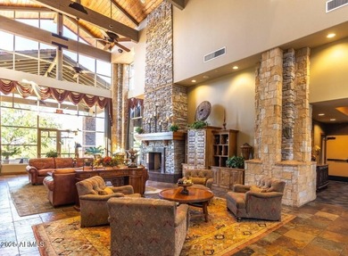 Gorgeous remodeled gated home in Las Sendas! Enter through the