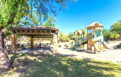 Gorgeous remodeled gated home in Las Sendas! Enter through the