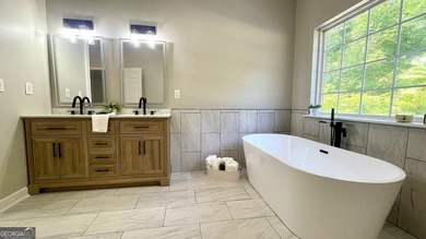 Welcome home to this stately 4-sided brick ranch tucked away on - photo 40