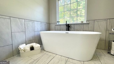 Welcome home to this stately 4-sided brick ranch tucked away on - photo 41