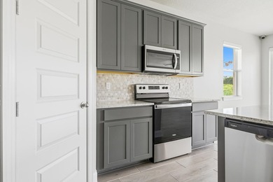 SELLER MOTIVATED!! Experience modern living in this newly built - photo 6
