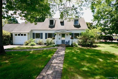 Welcome to this charming 4 bedroom, 2 bath Cape, ideally located - photo 1