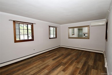 Welcome to this charming 4 bedroom, 2 bath Cape, ideally located - photo 2