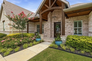 Welcome to a beautifully crafted custom home that seamlessly - photo 2