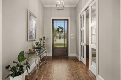 Welcome to a beautifully crafted custom home that seamlessly - photo 4