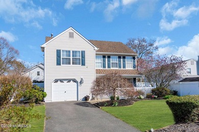 Discover this stunning 4-bedroom, 2.5-bath Colonial nestled on a - photo 3