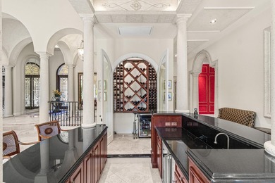 This home exudes old-world charm with its timeless Mediterranean - photo 6