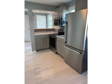 Completely newly renovated two bedroom, one bath Ranch with open - photo 8