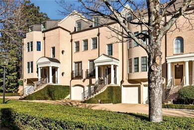 This beautifully renovated townhome offers refined living across