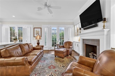 This beautifully renovated townhome offers refined living across