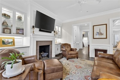 This beautifully renovated townhome offers refined living across