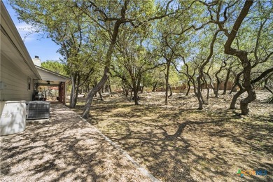 *2.25% Assumable VA loan*Set on 1.5 acres with mature live oaks - photo 26